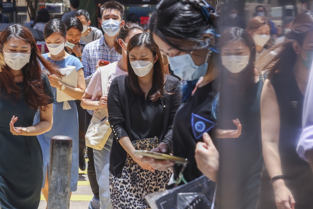 People wearing face masks in Central on August 15. Our Covid-19 regime is a deterrent to visiting Hong Kong, whether for business or pleasure. Photo: Nora Tam