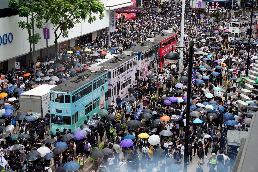 Protesters gather near the Sogo department store in Causeway Bay for a march to Wan Chai in a 2020 protest over the Beijing-imposed national security law. Photo: Robert Ng