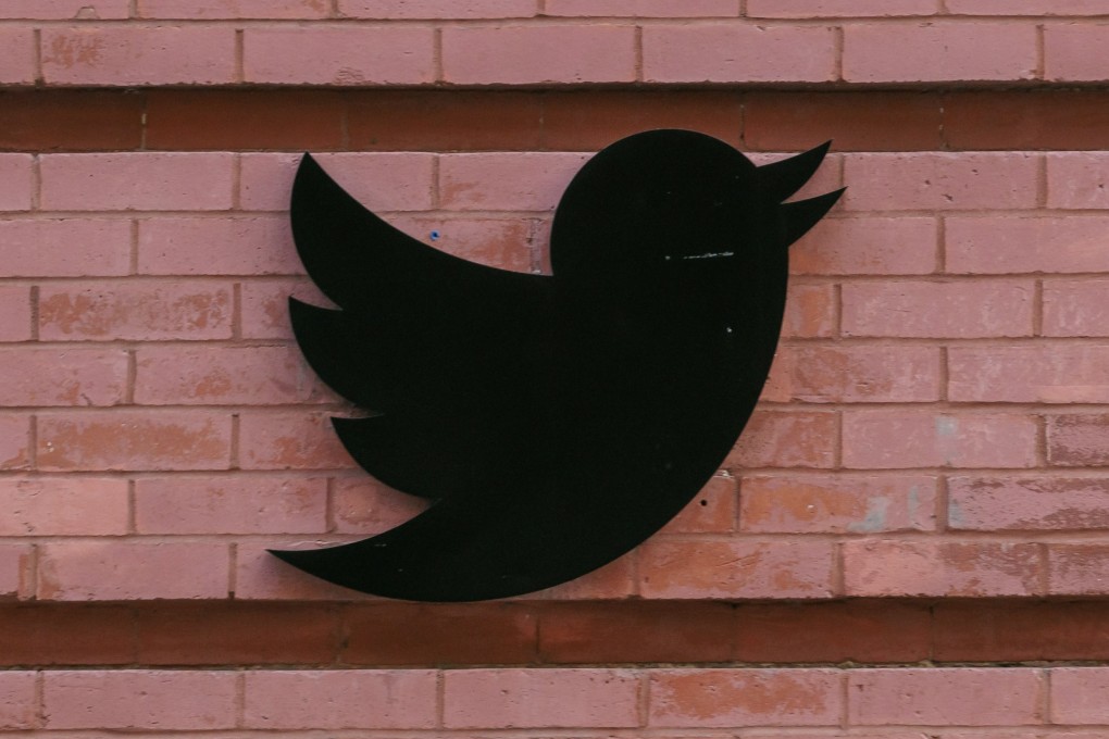 The Twitter logo is seen over the company’s offices in New York on Friday. Photo: EPA-EFE