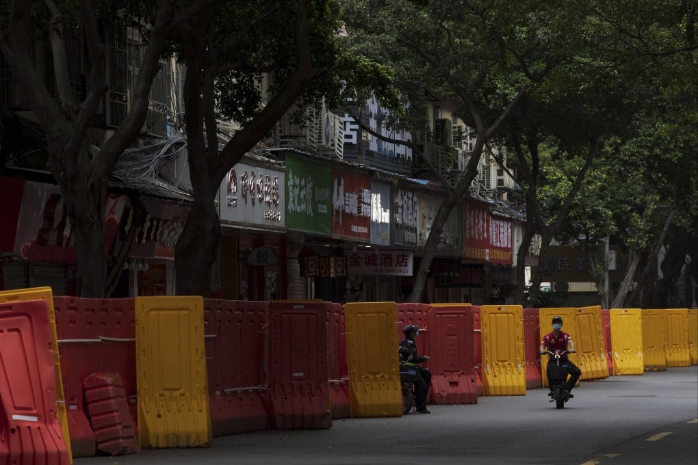 Shops barricaded as Covid-19 cases rise in Guangzhou, in south China’s Guangdong province. Photo: AP