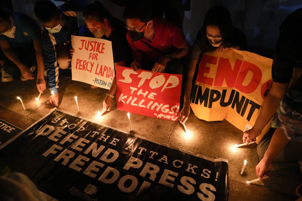 Activists condemn the killing of Filipino journalist Percival Mabasa during a rally in Quezon city, Philippines on October 4. Photo: AP