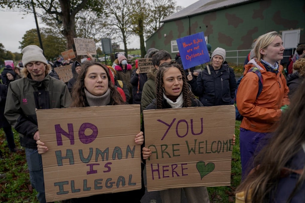 Demonstrators outside the Manston immigration short-term holding facility near Kent, England, protest about overcrowding and inhumane conditions. Photo: AP