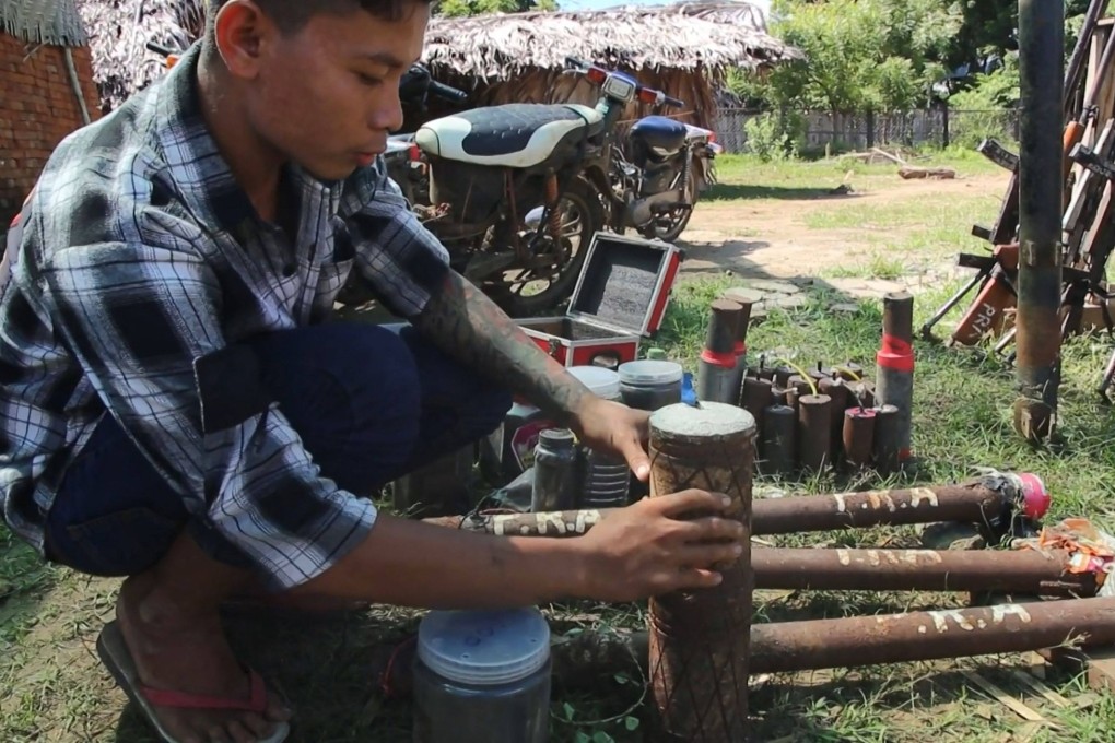 Members of the People Revolution Army (PRA) preparing homemade weapons in Pale township. Photo: AFPTV/ AFP