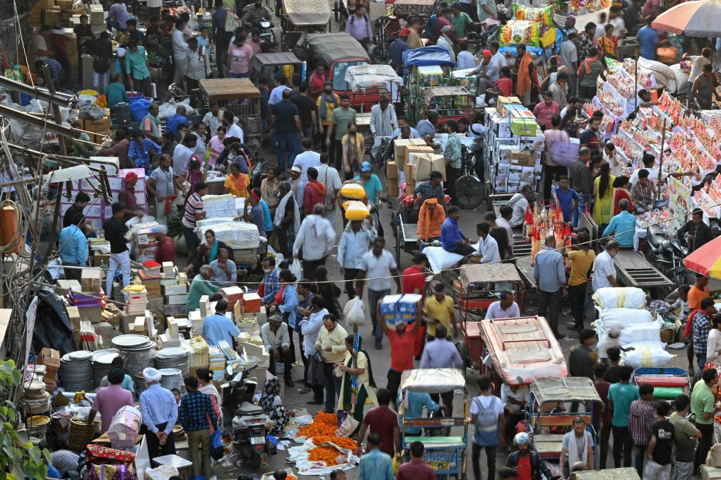 People crowd a market in New Delhi last month. India is projected to see an explosion in its urban population in the coming decades. Photo: AFP