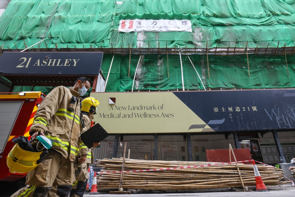 Firefighters arrive at the scene of an industrial accident in Tsim Sha Tsui where a construction worker was killed. Photo: May Tse