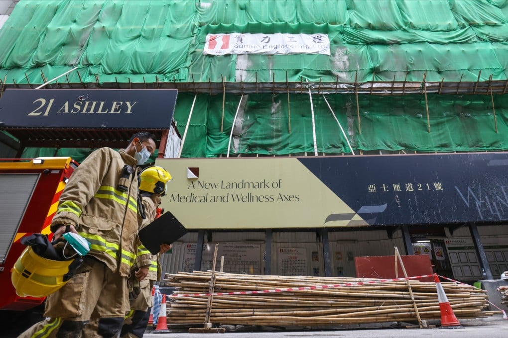 Firefighters arrive at the scene of an industrial accident in Tsim Sha Tsui where a construction worker was killed. Photo: May Tse