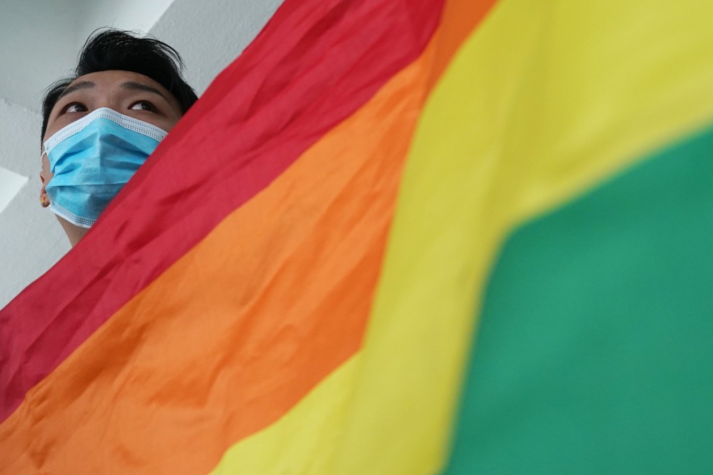 Jimmy Sham with a rainbow flag at the High Court in Admiralty in an earlier stage of the battle for marriage equality for same-sex couples. Photo: Felix Wong