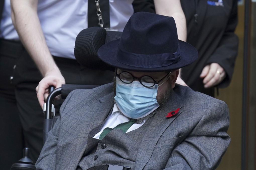 Nicholas Rossi leaves court in Edinburgh after a judge ruled he is a fugitive alleged to have faked his own death to escape rape allegations. Photo: AP