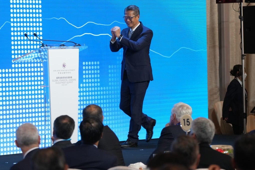 Financial Secretary Paul Chan arrives on stage at the Global Financial Leaders’ Investment Summit, at the Four Seasons Hotel in Central, on November 2. Photo: Sam Tsang