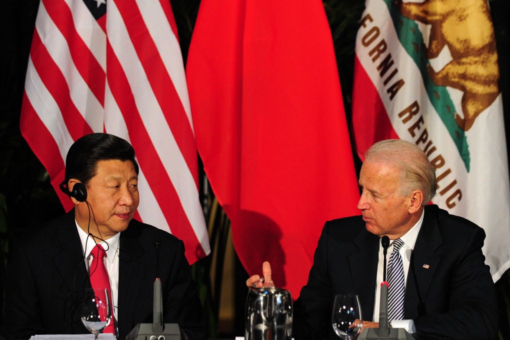 Then US vice-president Joe Biden speaks to visiting Chinese counterpart  Xi Jinping in Los Angeles in 2012. Photo: AFP