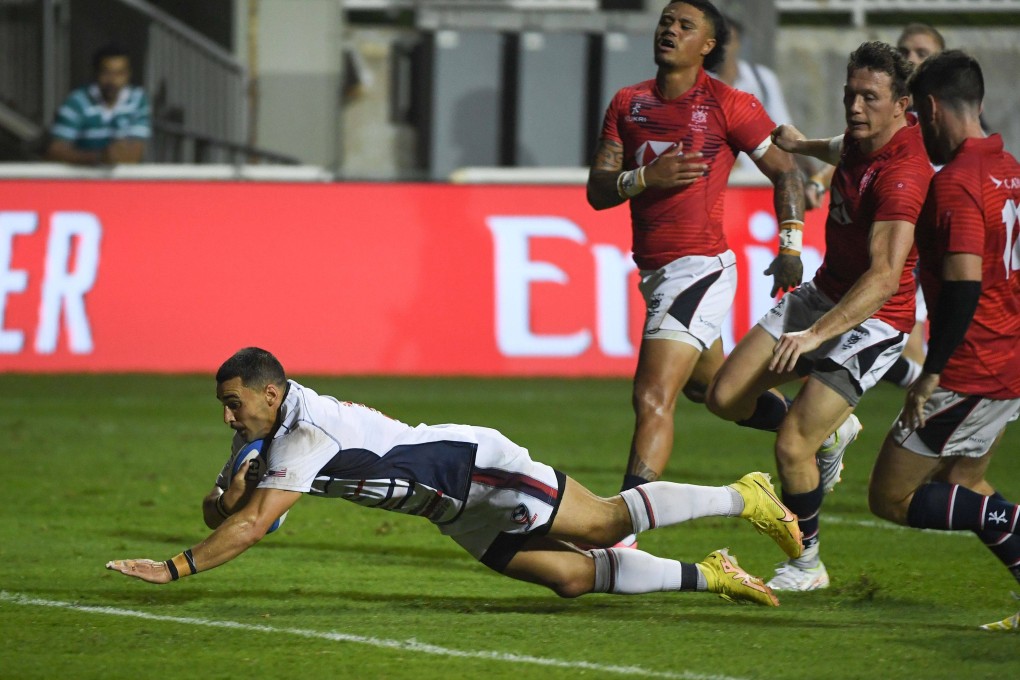 The USA’s Nate Augspurger  scores against Hong Kong during their Rugby World Cup final qualifying tournament clash at The Sevens Stadium in Dubai. Photo: World Rugby