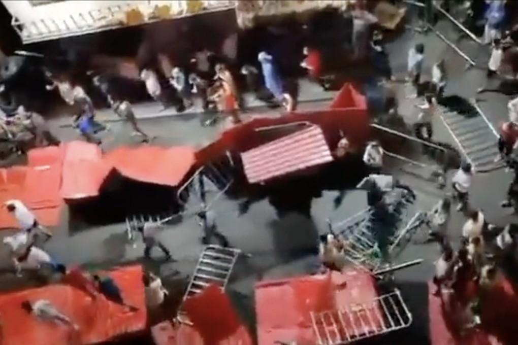 Videos circulating on social media on Monday showed Guangzhou residents breaking through lockdown barriers and breaching checkpoints. Photo: Twitter