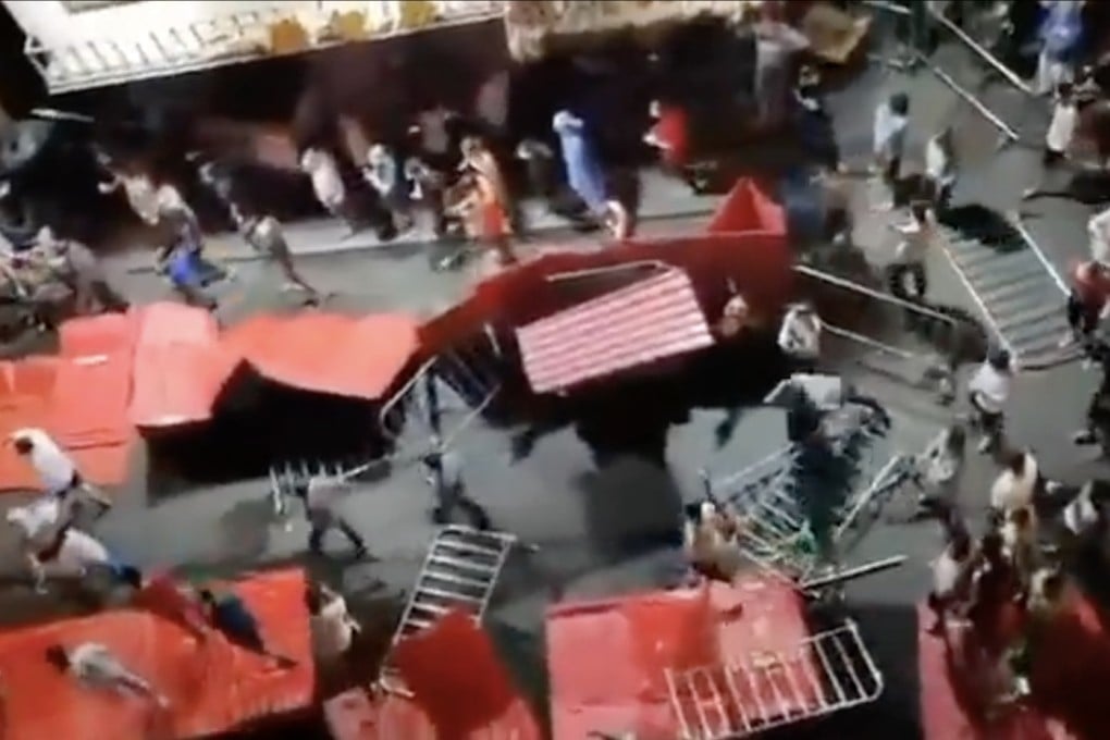 Videos circulating on social media on Monday showed Guangzhou residents breaking through lockdown barriers and breaching checkpoints. Photo: Twitter