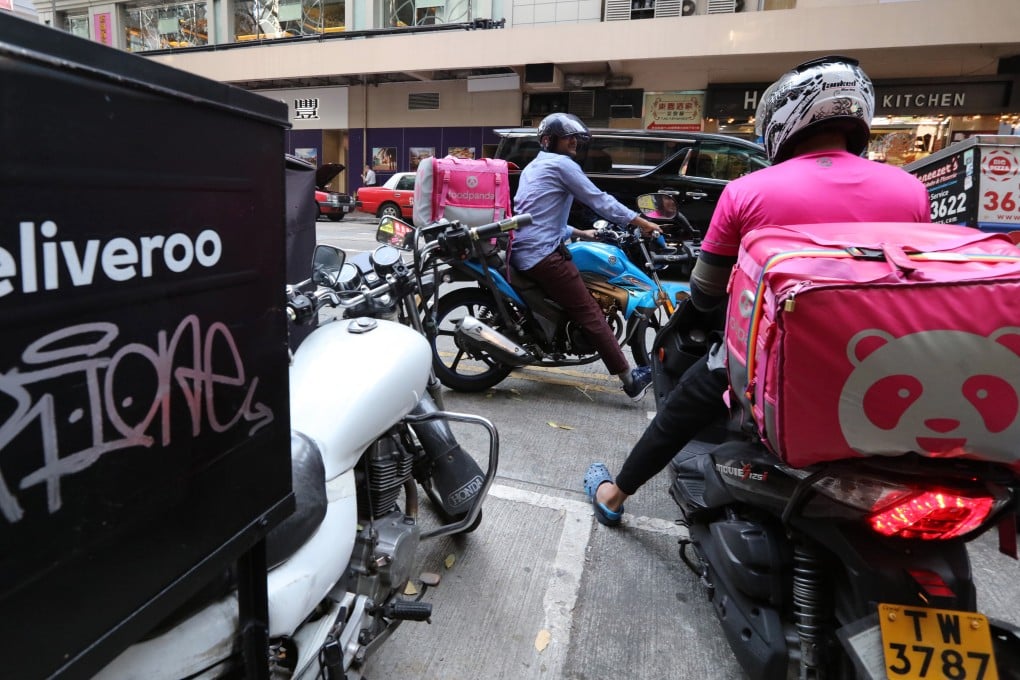 Food delivery workers in Wan Chai. Photo: Felix Wong