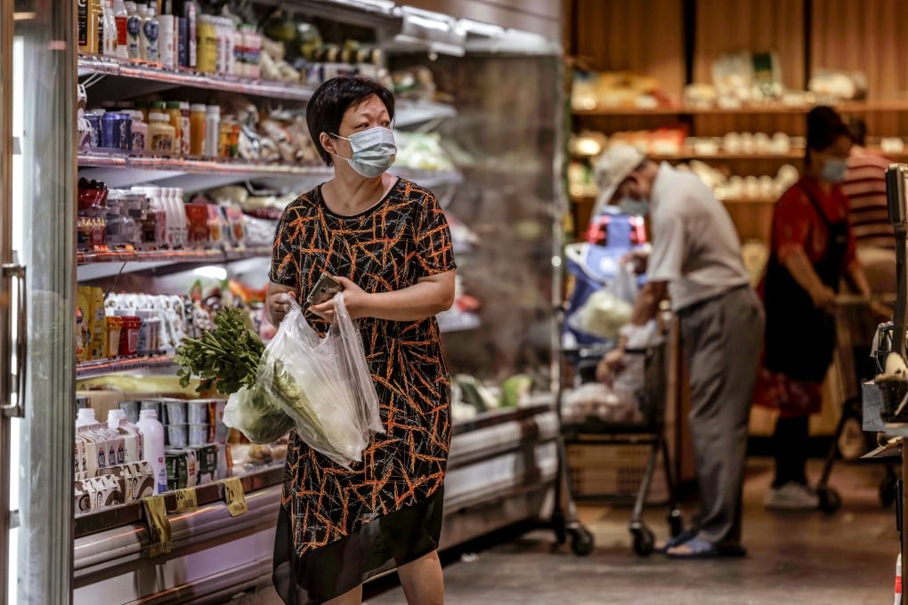 China’s local-level supply cooperatives sell essential agricultural materials, farm produce and consumer goods that rural residents rely on. Photo: EPA-EFE
