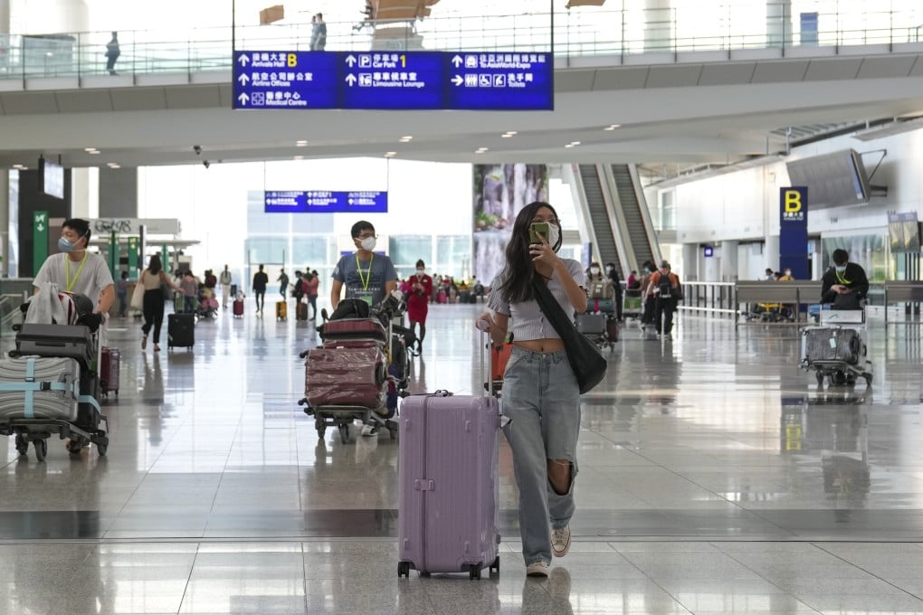 Passengers at the arrival hall of Hong Kong International Airport in Chek Lap Kok. Photo: Sam Tsang