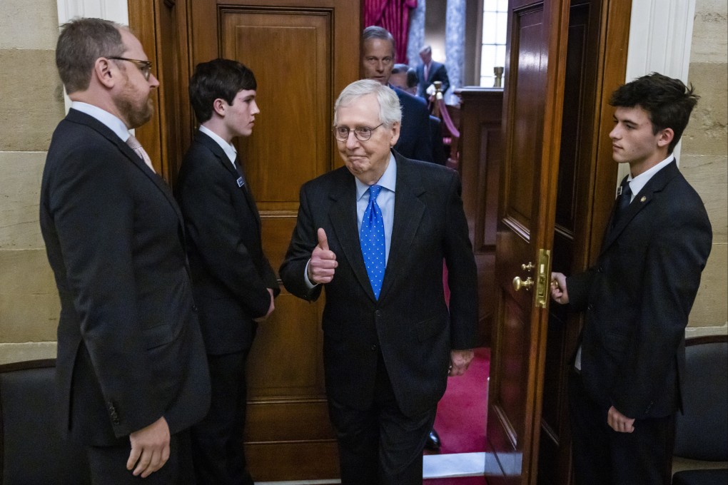 Senate Minority Leader Mitch McConnell gives the thumbs up as he emerges from the Old Senate Chamber in the US Capitol in Washington on Wednesday. Photo: EPA-EFE