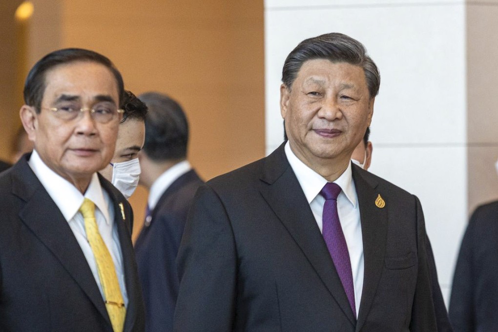 Thai Prime Minister Prayuth Chan-ocha and Chinese President Xi Jinping arrive at the Asia-Pacific Economic Cooperation summit in Bangkok on Friday. Photo: Bloomberg