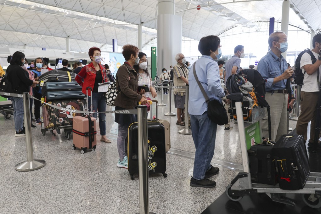 Passengers check in at Hong Kong International Airport. Photo: Yik Yeung-man