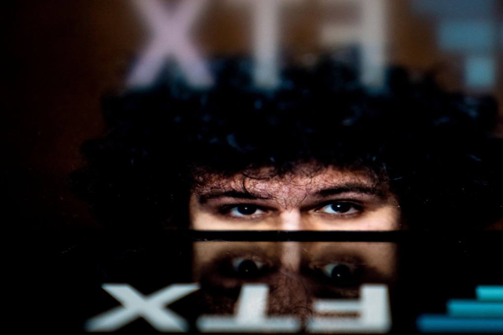 Former chief executive of FTX Samuel Bankman-Fried is seen in the logo of his now bankrupt company. Photo: AFP/File