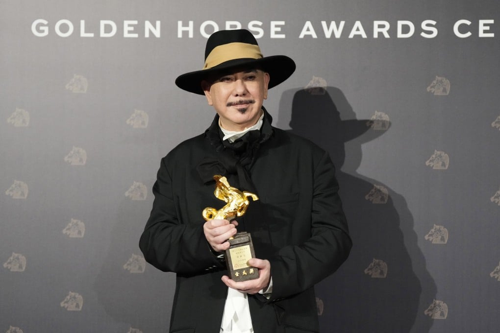 Hong Kong actor Anthony Wong holds his award for best actor at the Golden Horse Awards in Taipei, Taiwan on Saturday. Photo: AP