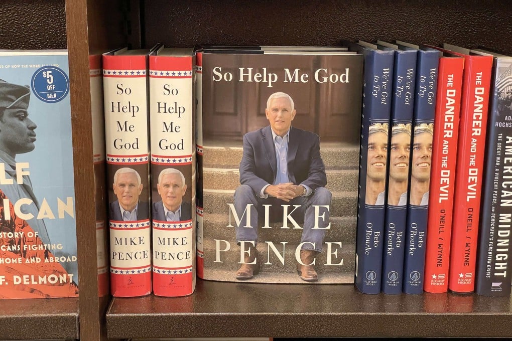 Mike Pence plays up his China credentials in his book So Help Me God. Photo: AFP