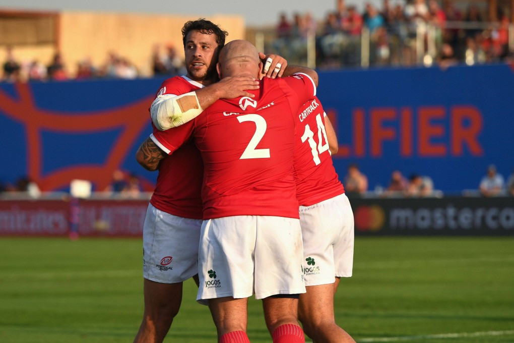Vincent Pinto (right) of Portugal celebrates with teammates after scoring their team’s fifth try during the RWC 2023 Final Qualifying Tournament against Kenya at The Sevens Stadium in Dubai. Photo: World Rugby via Getty Images