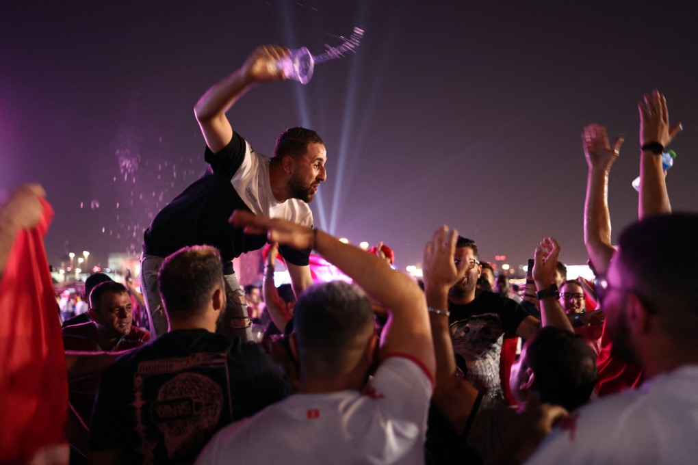 A fan seen with a beer in his hand at the opening of the Fifa fan festival at Al Bidda Park in Doha, Qatar. Photo: Reuters