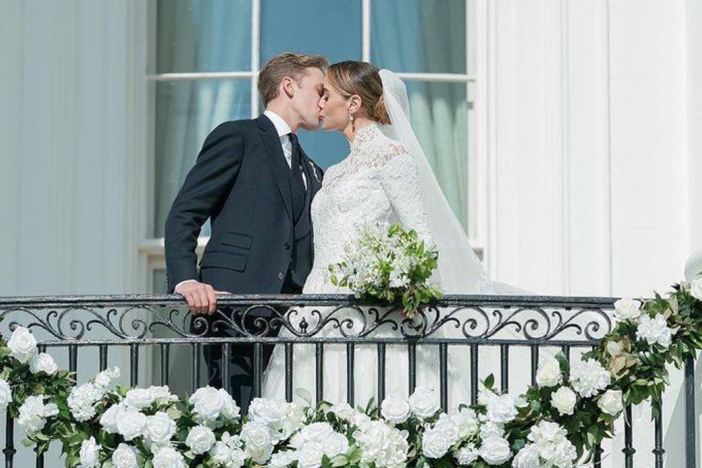 Naomi Biden wore a Ralph Lauren gown with a lace neckline for her White House wedding to Peter Neal | South China Morning Post Naomi Biden wore a Ralph Lauren gown with a lace neckline for her White House wedding to Peter Neal | South China Morning Post