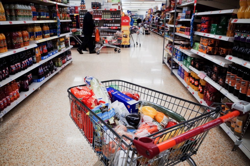 A shopping trolley filled with food is seen in a supermarket in Huddersfield, Britain. Photo: EPA-EFE