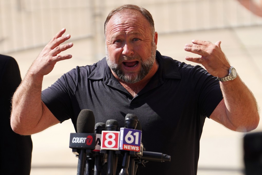 InfoWars founder Alex Jones speaks to the media outside court in the US in September. Photo: Getty Images/TNS