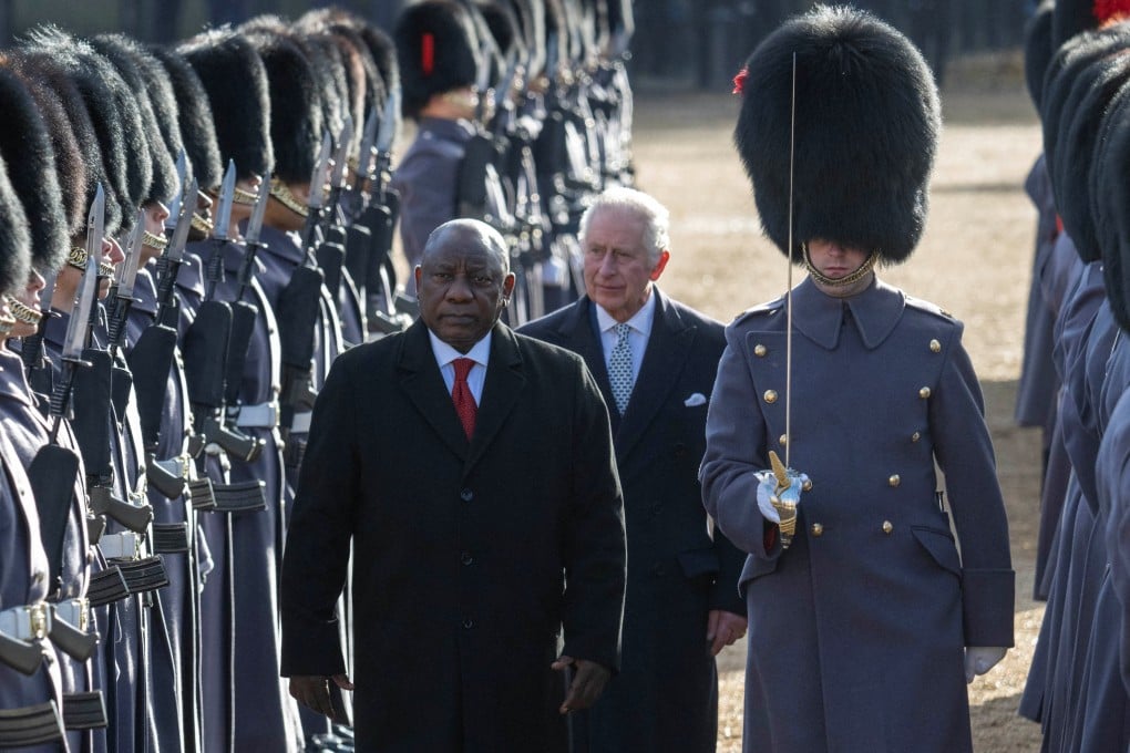Britain’s King Charles walks with the President of South Africa Cyril Ramaphosa at a Ceremonial Welcome in London on Tuesday. Photo: Reuters