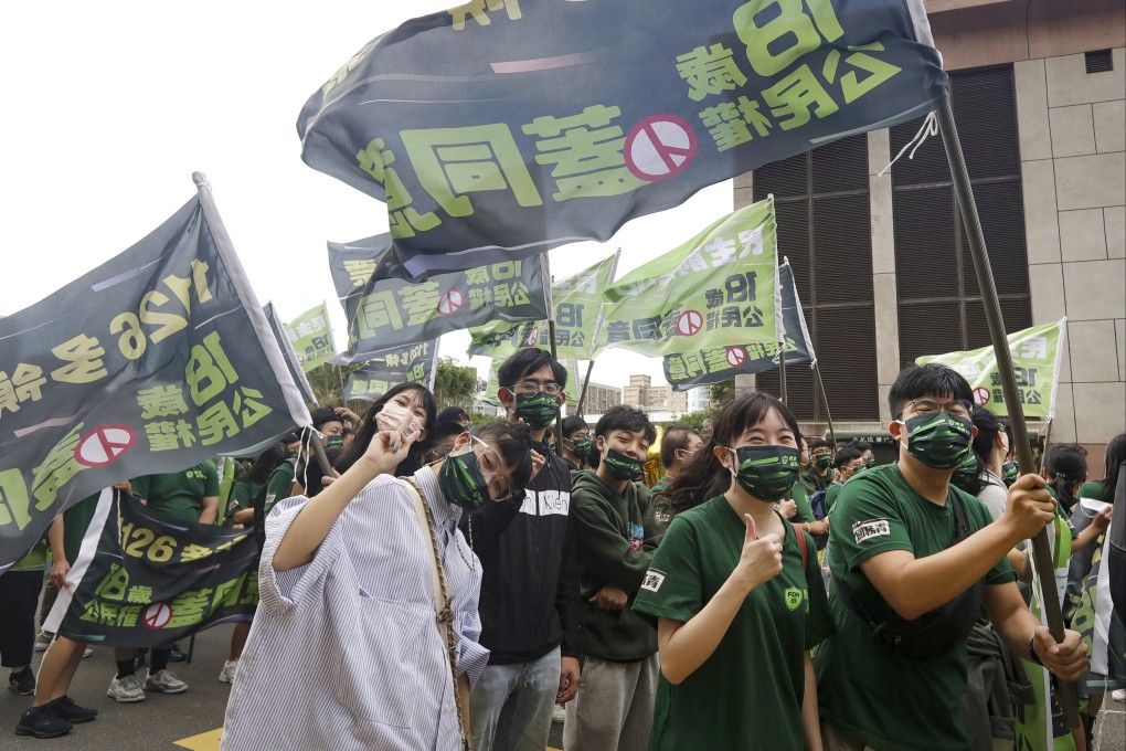 Young Taiwanese at an election rally in Taipei on Sunday. Photo: AP