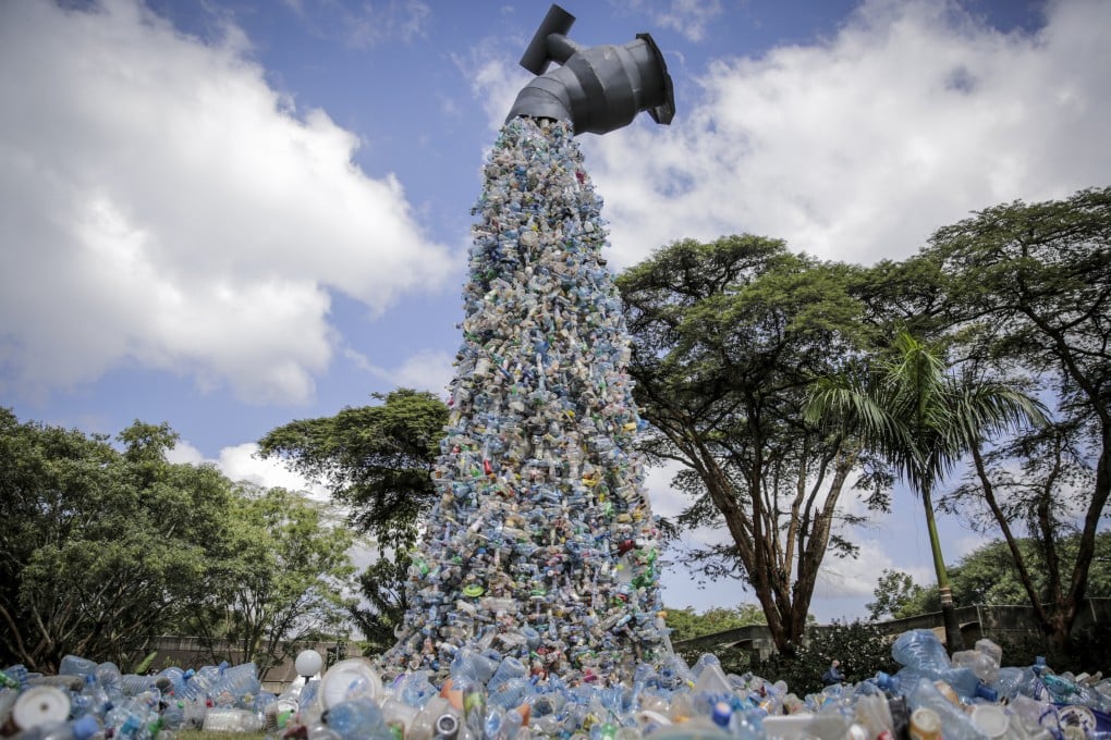 A giant art sculpture showing plastic bottles gushing from a tap is seen in Nairobi, Kenya, where a UN Environment Assembly meeting took place on March 2 to discuss a binding international framework to address the growing problem of plastic waste. Photo: AP