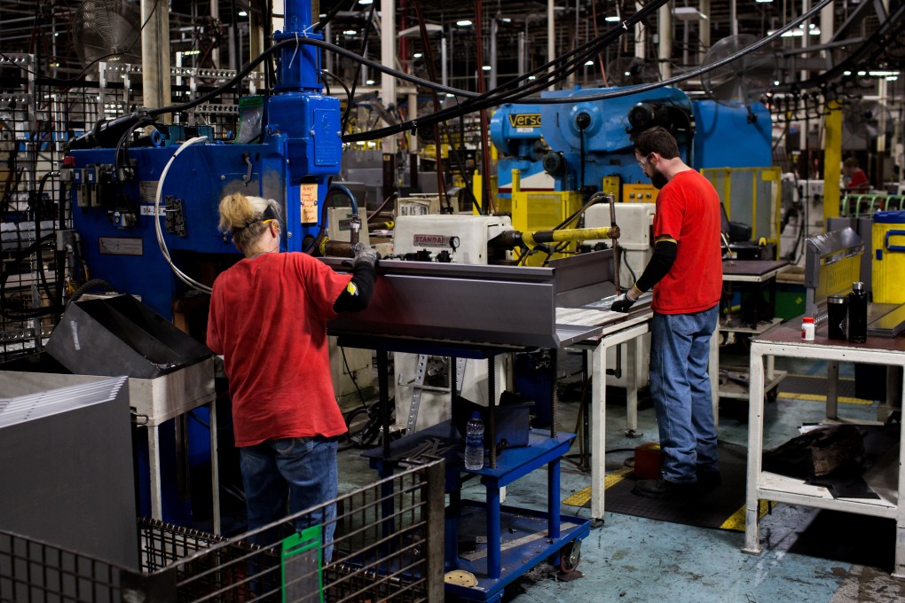 Workers assemble steel tool chests at a tools manufacturing facility in Sedalia, Missouri, on July 17, 2018. Photo: Bloomberg