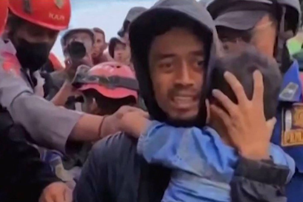 A six-year-old boy was pulled out of the rubble in Cianjur, West Java on Wednesday. Photo: Bogor Administraion/AFP