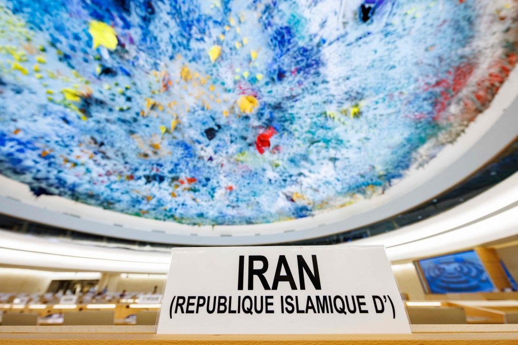 A sign at the seat of the Iranian representative prior to the beginning of a special session of the UN Human Rights Council on the situation in Iran. Photo: AFP