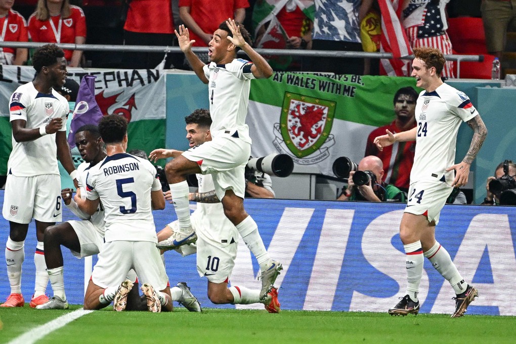 USA’s players celebrate their opening goal during the Qatar 2022 World Cup group B match against Wales at the Ahmad Bin Ali Stadium in Al-Rayyan, west of Doha. Photo: AFP