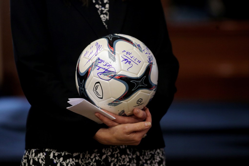 New Zealand Prime Minister Jacinda Ardern holds a souvenir football as her country looks forward to co-hosting the Women’s World Cup. Photo: EPA-EFE