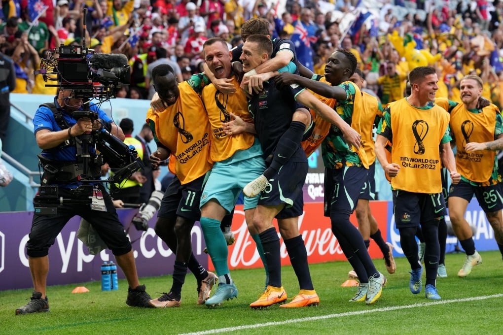 Australia’s Mitchell Duke celebrates scoring against Tunisia. Photo: dpa