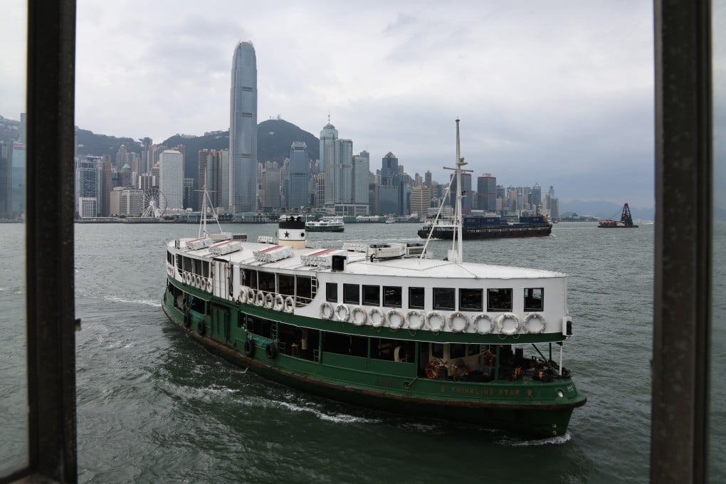 A Star Ferry sails through the Victoria Harbour to Tsim Sha Tsui amid the cloudy weather. Photo: K. Y. Cheng