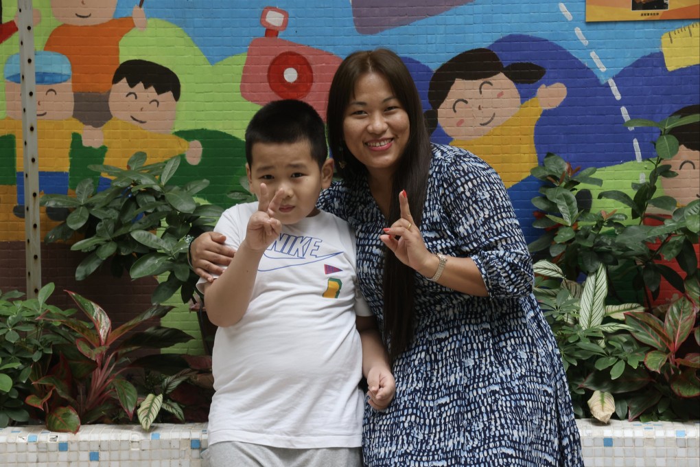 OSC beneficiary Jebson, eight, and his mother Barsha Gurung. Photo: Jonathan Wong