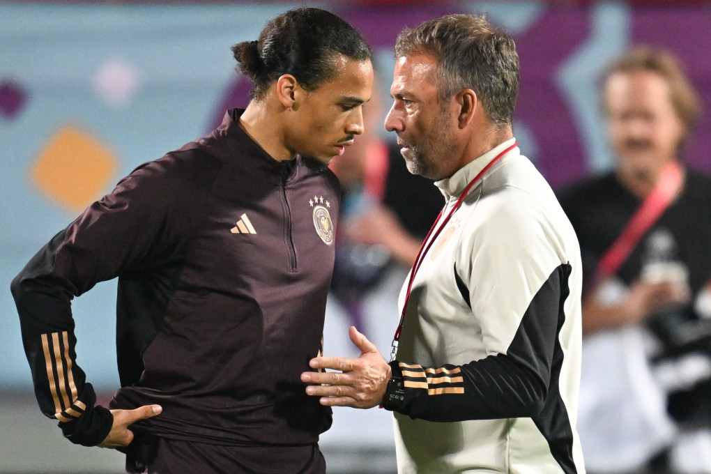 German coach Hansi Flick talks to Leroy Sane during a training session ahead of Sunday’s clash against Spain. Photo: dpa