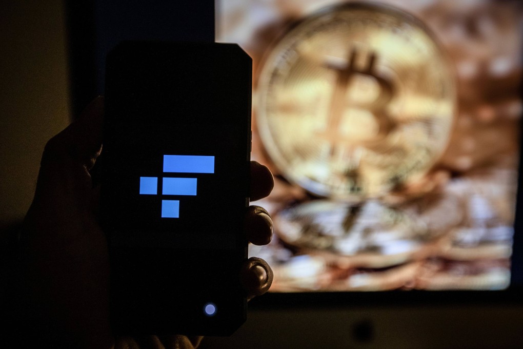 The FTX logo arranged on a smartphone on November 15, 2022. Photo: Bloomberg