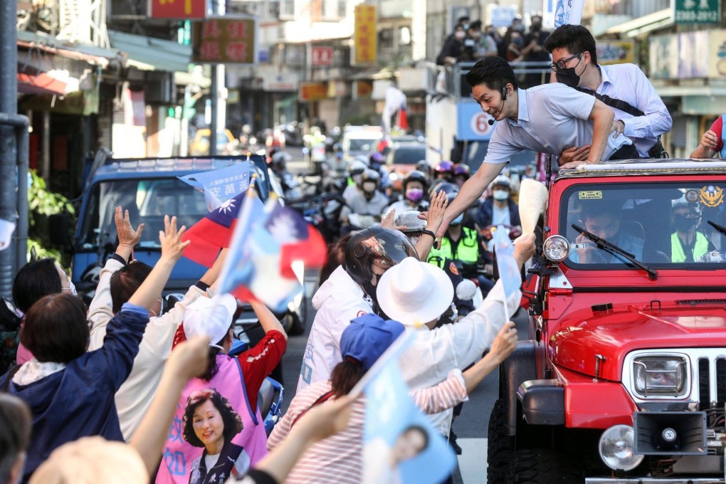 Taipei mayor-elect Wayne Chiang greets members of the public on November 27. Taiwan’s ruling party suffered a resounding defeat in island-wide local elections a little more than a year before a new president is chosen. Photo: Bloomberg