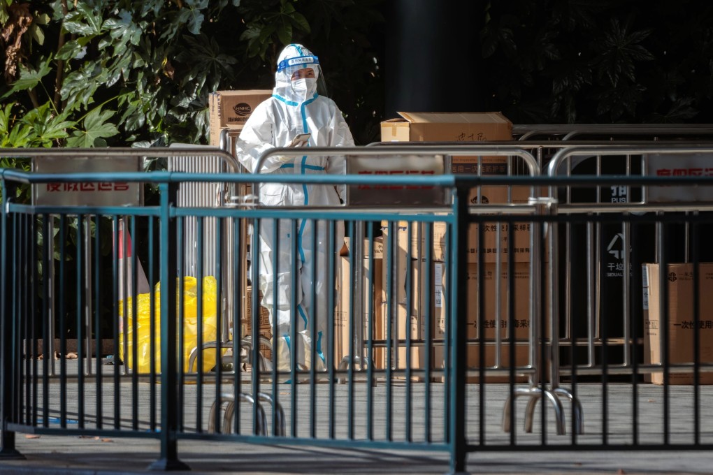 A medical worker is seen at Shanghai Disney Resort in this file photo from November 1 this year. The resort apologised for the ‘temporary closure’ on Tuesday. Photo: EPA-EFE