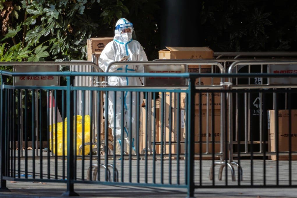 A medical worker is seen at Shanghai Disney Resort in this file photo from November 1 this year. The resort apologised for the ‘temporary closure’ on Tuesday. Photo: EPA-EFE