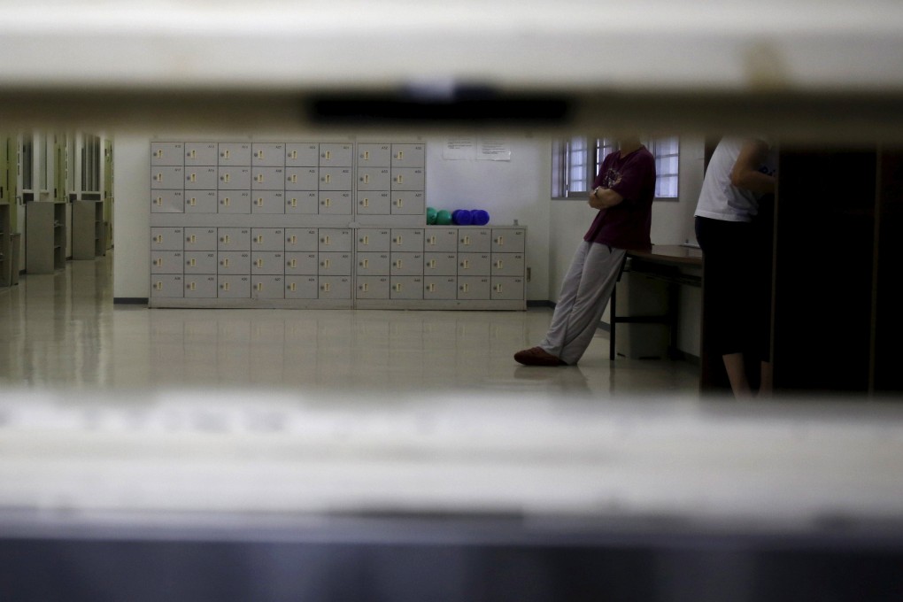 Inmates are seen through a hatch at a detention centre in Tokyo. Hanging has been Japan’s sole execution method for around a century and a half. Photo: Reuters