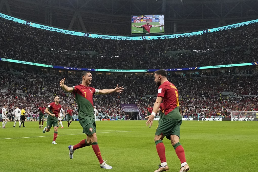Portugal’s Cristiano Ronaldo celebrates his side’s opening goal with Bruno Fernandes. Photo: AP