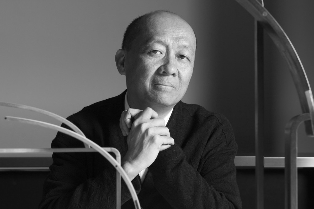 Hong Kong architect Chi-wing Lo with two goat sculptures he designed for Project Twelve, which explored contemporary interpretations of Chinese zodiac animals.